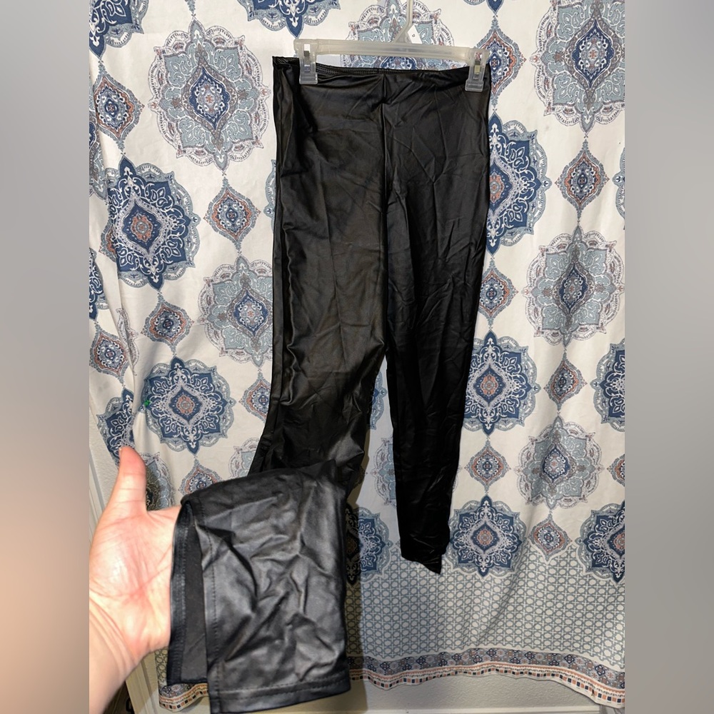 Black leather type of material hardly ever been worn